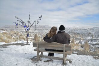 Couple enjoying snowfall in Solang Valley Manali