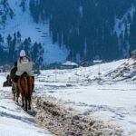 Snow-covered Gulmarg hills during winter adventure in Kashmir