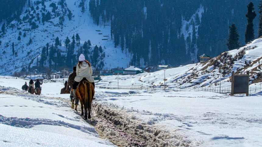 Snow-covered Gulmarg hills during winter adventure in Kashmir