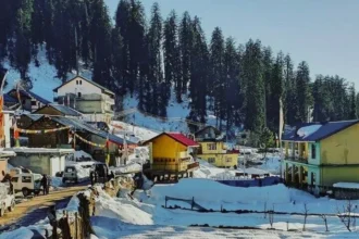 Jana Waterfall surrounded by apple orchards